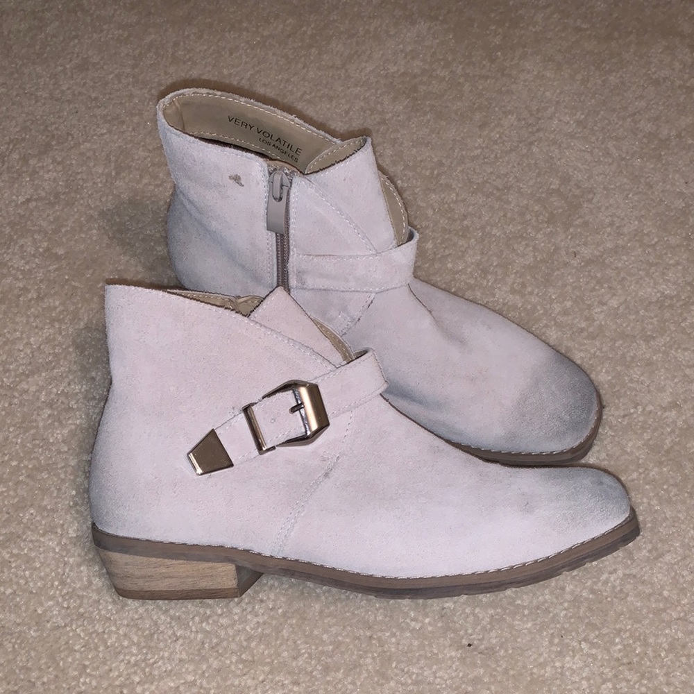 White leather ankle boots with squared toes